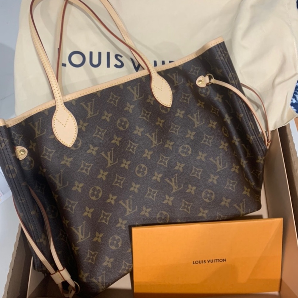 Brand new in the box with receipt Louis Vuitton Neverfull MM.
